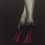 Elegant high heels with a unique red sole design.